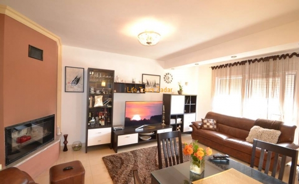 kitchen with dining and living area